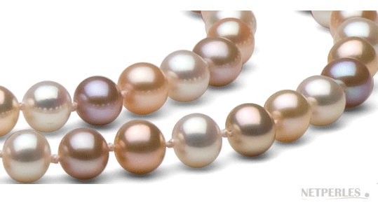 Primo piano sulle perle d'acqua dolce di qualità AAA praticamente rotonde multicolori