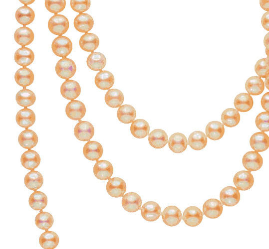Un primo piano su queste perle dal colore pastello rosa pesca, delicate e luminose