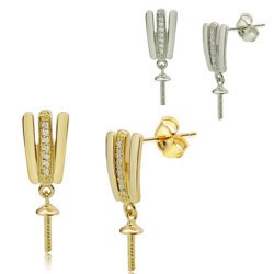 Paio di appretti per orecchini in oro 18k con diamanti