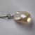 Pendente e catenina Argento 925 Perla Fireball Acqua Dolce 12x17 mm colore metallico bianco rosato