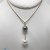 Collana Pendente Perla di Tahiti e Perla Australiana Oro 18k